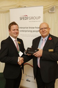 The award was presented by Nic Preston, CEO of SFEDI Awards (left), to Graham Cripps from Results Consortium).